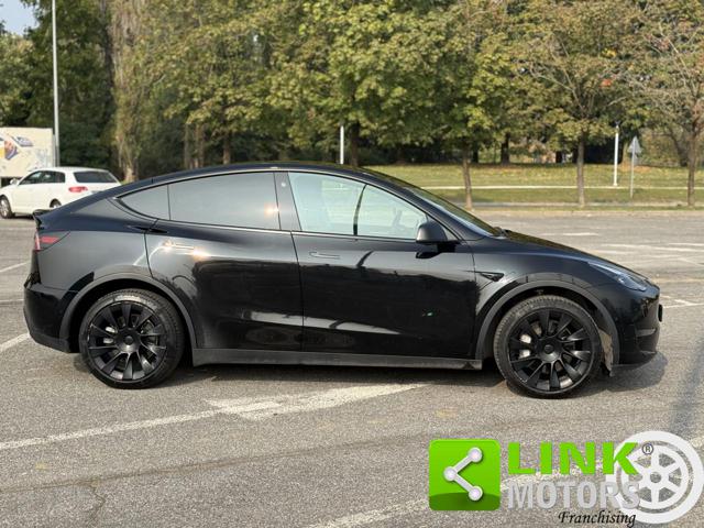 Tesla Model Y longe - foto 4 di 4